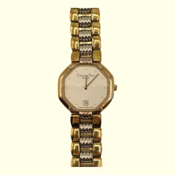 Christian Dior quartz dateGold
Visit
plated, white dial ladies watch vintage - Picture 6 of 13